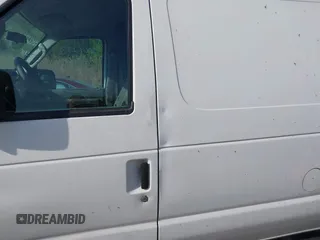 2009 Ford Econoline Cargo with VIN 1FTNE24W89DA31505, listed as a IAAI auction lot 42066233 with 267,327 mi miles. Bid and sale history available at carsss.com. Image 14.