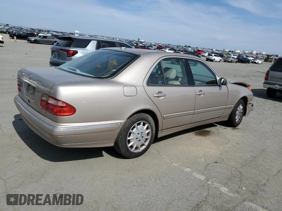 2001 Mercedes-Benz E-Class with VIN WDBJF65J11B357893, listed as a Copart auction lot 48573305 with 141,044 mi miles and Salvage Title. Bid and sale history available at carsss.com. Image 3.