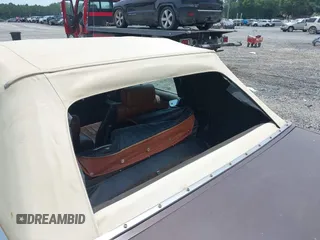 1982 Chrysler LeBaron z VIN 1C3BC55D2CG145033, wystawiony jako IAAI lot #42145500 z przebiegiem 20 643 mil mil oraz . Historia ofert i sprzedaży dostępna na DreamBid. Obrazek 6.