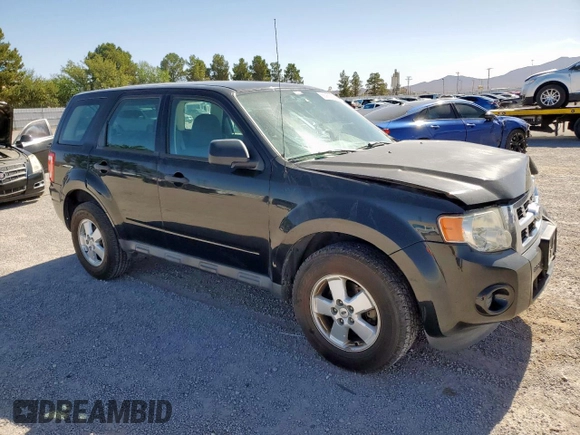2011 Ford Escape XLS with VIN 1FMCU0C79BKC04115, listed as a Copart auction lot 56982375 with 193,078 mi miles and Salvage title. Bid and sale history available at DreamBid. Image 4.