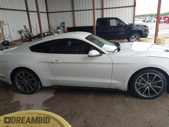 2019 Ford Mustang EcoBoost z VIN 1FA6P8TH1K5168795, wystawiony jako IAAI lot #42105634 z przebiegiem 61 480 mil mil oraz . Historia ofert i sprzedaży dostępna na DreamBid. Obrazek 13.