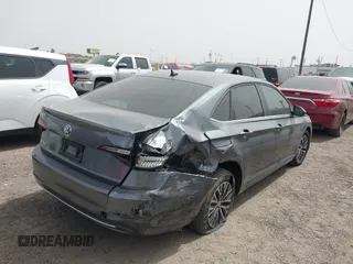 2021 Volkswagen Jetta S z VIN 3VWC57BU0MM032910, wystawiony jako IAAI lot #41836545 z przebiegiem 64 042 mil mil oraz . Historia ofert i sprzedaży dostępna na DreamBid. Obrazek 6.