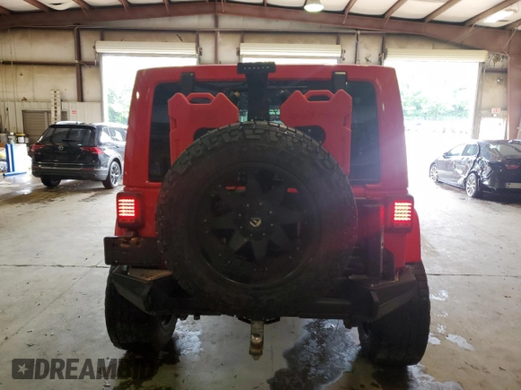 2016 Jeep Wrangler Unlimited Sahara z VIN 1C4BJWEG9GL219739, wystawiony jako Copart lot #59686315 z przebiegiem 59 242 mil mil oraz Szkoda całkowita • Salvage title. Historia ofert i sprzedaży dostępna na DreamBid. Obrazek 6.