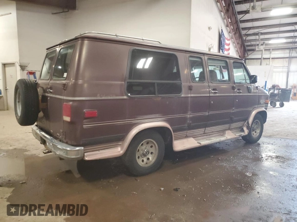 1992 Chevrolet Chevy Van z VIN 2GBEG25K3N4150299, wystawiony jako Copart lot #74099444 z przebiegiem 156 341 mil mil oraz Tytuł czysty. Historia ofert i sprzedaży dostępna na DreamBid. Obrazek 3.