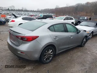 2016 Mazda 3 i Grand Touring z VIN 3MZBM1X74GM245295, wystawiony jako IAAI lot #41079843 z przebiegiem 183 480 mil mil oraz . Historia ofert i sprzedaży dostępna na DreamBid. Obrazek 4.
