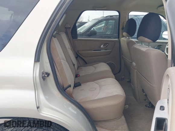 2005 Mercury Mariner Convenience z VIN 4M2YU57Z85DJ28652, wystawiony jako IAAI lot #41524903 z przebiegiem 228 497 mil mil oraz . Historia ofert i sprzedaży dostępna na DreamBid. Obrazek 8.