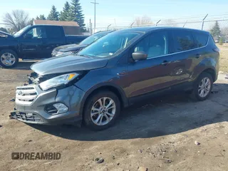 2017 Ford Escape SE with VIN 1FMCU0GD0HUB80123, listed as a IAAI auction lot 41895514 with 61,680 mi miles and . Bid and sale history available at DreamBid. Image 17.