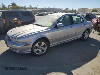 2002 Jaguar X-Type with VIN SAJEA51C52WC08243, listed as a Copart auction lot 76306044 with Not Provided miles and Clean Title. Bid and sale history available at carsss.com. Image 1.