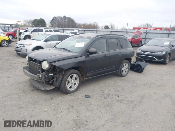 2008 Jeep Compass Sport with VIN 1J8FT47058D519816, listed as a IAAI auction lot 41694184 with 238,719 mi miles. Bid and sale history available at carsss.com. Image 2.