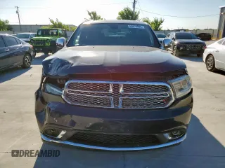 2016 Dodge Durango SXT with VIN 1C4RDHAG9GC346546, listed as a Copart auction lot 60976885 with 145,260 mi miles and Salvage title. Bid and sale history available at DreamBid. Image 5.