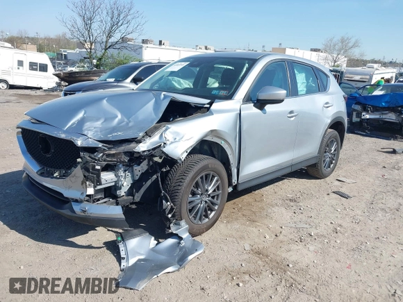 2019 Mazda CX-5 Sport with VIN JM3KFBBM7K0668830, listed as a IAAI auction lot 42069505 with Not Provided miles and . Bid and sale history available at DreamBid. Image 2.