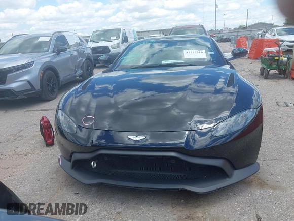2020 Aston Martin Vantage z VIN SCFSMGAW4LGN03097, wystawiony jako IAAI lot #42227516 z przebiegiem Nie podano mil oraz . Historia ofert i sprzedaży dostępna na DreamBid. Obrazek 13.