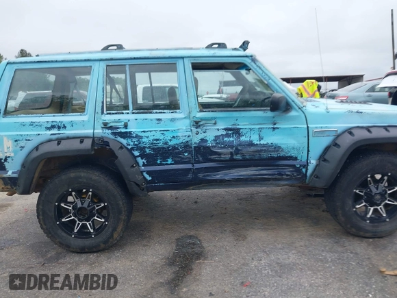 1997 Jeep Cherokee SE z VIN 1J4FJ28S3VL573144, wystawiony jako IAAI lot #41965201 z przebiegiem 298 276 mil mil oraz . Historia ofert i sprzedaży dostępna na DreamBid. Obrazek 13.
