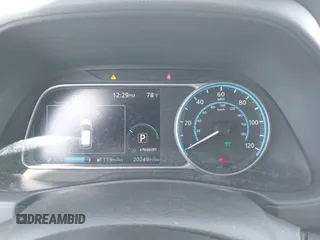 2021 Nissan LEAF SV with VIN 1N4AZ1CV0MC556505, listed as a IAAI auction lot 42438895 with 20,249 mi miles and . Bid and sale history available at DreamBid. Image 7.