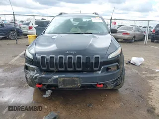 2014 Jeep Cherokee Trailhawk with VIN 1C4PJMBS5EW128658, listed as a IAAI auction lot 41722320 with 1 mi miles. Bid and sale history available at carsss.com. Image 6.