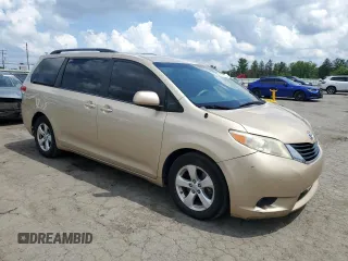 2014 Toyota Sienna LE AAS with VIN 5TDKK3DC4ES412399, listed as a Copart auction lot 65276625 with 264,283 mi miles and Clean title. Bid and sale history available at DreamBid. Image 4.