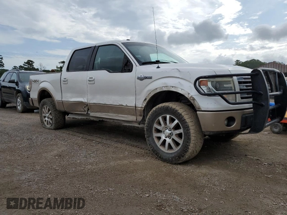 2014 Ford F-150 XL with VIN 1FTFW1EFXEKF15692, listed as a Copart auction lot 61142145 with 215,008 mi miles and Salvage title. Bid and sale history available at DreamBid. Image 4.