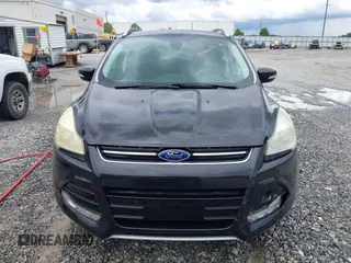 2015 Ford Escape Titanium с VIN 1FMCU0JXXFUB10676, выставлен на аукционе IAAI как лот 42412073 с пробегом 129 737 миль миль и . История ставок и продаж доступна на DreamBid. Изображение 12.