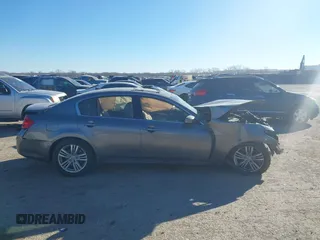 2012 Infiniti G25 Journey z VIN JN1DV6AP6CM810606, wystawiony jako IAAI lot #41254533 z przebiegiem Nie podano mil oraz . Historia ofert i sprzedaży dostępna na DreamBid. Obrazek 13.