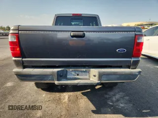 2005 Ford Ranger XLT z VIN 1FTZR45E05PA33894, wystawiony jako Copart lot #65205595 z przebiegiem 154 807 mil mil oraz Czysty tytuł • Clean title. Historia ofert i sprzedaży dostępna na DreamBid. Obrazek 6.
