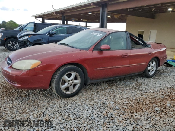 2000 Ford Taurus SES with VIN 1FAFP55U1YA262488, listed as a Copart auction lot 52312645 with 128,621 mi miles and Salvage Title. Bid and sale history available at DreamBid. Image 1.