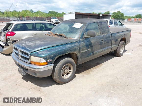 1998 Dodge Dakota SLT with VIN 1B7GL22X4WS554408, listed as a IAAI auction lot 42202021 with 147,765 mi miles. Bid and sale history available at carsss.com. Image 2.