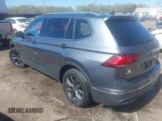 2022 Volkswagen Tiguan SE with VIN 3VV3B7AX1NM120097, listed as a IAAI auction lot 41967493 with 57,802 mi miles and . Bid and sale history available at DreamBid. Image 3.