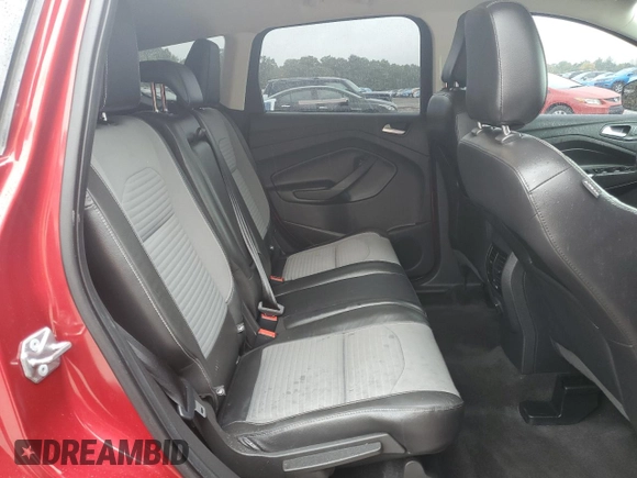 2018 Ford Escape SE z VIN 1FMCU9GD4JUA49819, wystawiony jako Copart lot #73023734 z przebiegiem 96 228 mil mil oraz Szkody całkowita. Historia ofert i sprzedaży dostępna na DreamBid. Obrazek 11.
