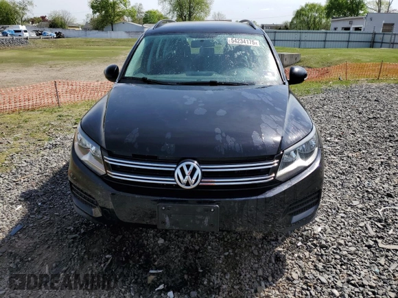 2017 Volkswagen Tiguan S with VIN WVGBV7AX2HK054782, listed as a Copart auction lot 54234175 with 67,044 mi miles and Salvage Title. Bid and sale history available at DreamBid. Image 5.