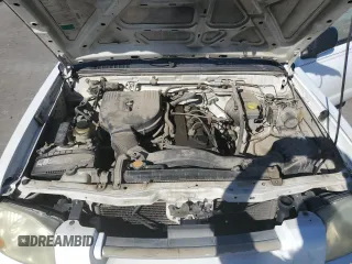 2004 Nissan Frontier XE z VIN 1N6DD26TX4C419056, wystawiony jako Copart lot #43556315 z przebiegiem 261 776 mil mil oraz Szkoda całkowita • Salvage title. Historia ofert i sprzedaży dostępna na DreamBid. Obrazek 11.