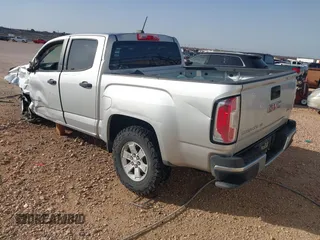 2020 GMC Canyon 2WD with VIN 1GTG5BEN7L1180236, listed as a IAAI auction lot 41769262 with 59,993 mi miles. Bid and sale history available at carsss.com. Image 3.