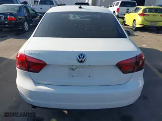 2015 Volkswagen Passat 1.8T S with VIN 1VWAT7A38FC084408, listed as a IAAI auction lot 41014374 with 112,174 mi miles. Bid and sale history available at carsss.com. Image 16.