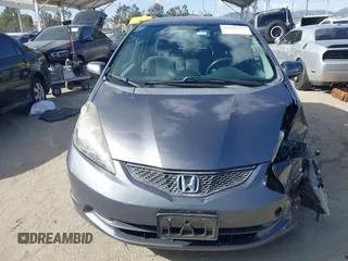 2013 Honda Fit with VIN JHMGE8H36DC056640, listed as a IAAI auction lot 41969727 with 94,564 mi miles. Bid and sale history available at carsss.com. Image 12.