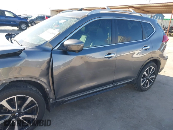 2017 Nissan Rogue SL z VIN 5N1AT2MT8HC749372, wystawiony jako IAAI lot #41622839 z przebiegiem 90 638 mil mil oraz . Historia ofert i sprzedaży dostępna na DreamBid. Obrazek 19.