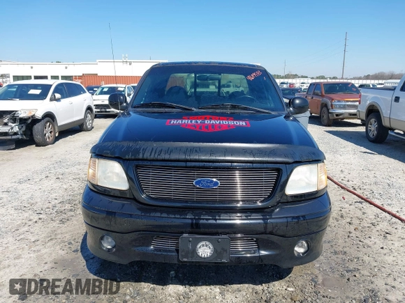 2000 Ford F-150 XL z VIN 2FTRX07L5YCB11117, wystawiony jako IAAI lot #41649583 z przebiegiem 240 557 mil mil oraz . Historia ofert i sprzedaży dostępna na DreamBid. Obrazek 6.