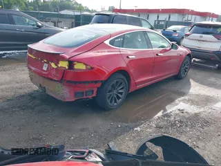 2020 Tesla Model S Long Range with VIN 5YJSA1E25LF396213, listed as a IAAI auction lot 42383231 with 73,125 mi miles and . Bid and sale history available at DreamBid. Image 4.