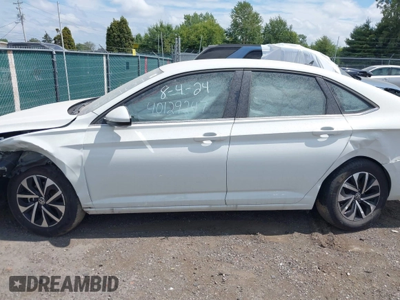 2023 Volkswagen Jetta S with VIN 3VW4M7BU9PM036109, listed as a IAAI auction lot 40129247 with 18,547 mi miles and . Bid and sale history available at DreamBid. Image 14.