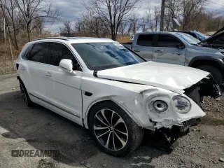 2020 Bentley Bentayga V8 z VIN SJAAM2ZV2LC028213, wystawiony jako Copart lot #52550255 z przebiegiem 50 238 mil mil oraz Szkody całkowita. Historia ofert i sprzedaży dostępna na DreamBid. Obrazek 4.