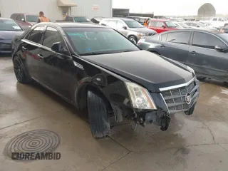 2009 Cadillac CTS RWD z VIN 1G6DJ577490114095, wystawiony jako IAAI lot #41756432 z przebiegiem 215 797 mil mil oraz . Historia ofert i sprzedaży dostępna na DreamBid. Obrazek 1.
