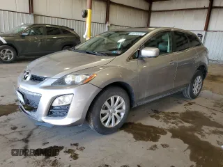 2012 Mazda CX-7 i Touring z VIN JM3ER2CM8C0415326, wystawiony jako Copart lot #86450424 z przebiegiem 82 810 mil mil oraz Szkoda całkowita • Salvage title. Historia ofert i sprzedaży dostępna na DreamBid. Obrazek 1.