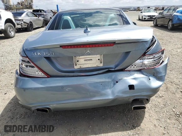 2012 Mercedes-Benz SLK 350 with VIN WDDPK5HA9CF017809, listed as a Copart auction lot 56926895 with 106,692 mi miles and Clean title. Bid and sale history available at DreamBid. Image 6.