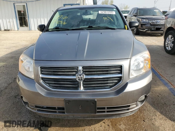 2011 Dodge Caliber Heat z VIN 1B3CB5HA4BD222393, wystawiony jako Copart lot #52901255 z przebiegiem 108 070 mil mil oraz Szkody całkowita. Historia ofert i sprzedaży dostępna na DreamBid. Obrazek 5.