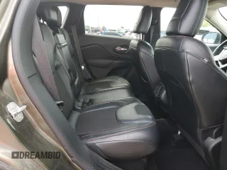 2015 Jeep Cherokee Trailhawk with VIN 1C4PJMBSXFW545534, listed as a Copart auction lot 62236885 with 148,448 mi miles and Clean title. Bid and sale history available at DreamBid. Image 10.