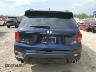 2023 Honda Passport Elite with VIN 5FNYF8H07PB036929, listed as a Copart auction lot 55981185 with 27,523 mi miles and Salvage title. Bid and sale history available at DreamBid. Image 6.