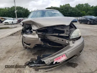 2005 Ford Taurus SE with VIN 1FAFP53205A252967, listed as a Copart auction lot 58449495 with Not provided miles and Salvage title. Bid and sale history available at DreamBid. Image 5.