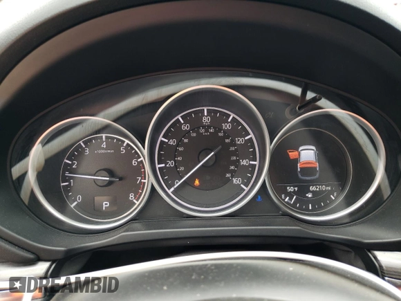 2018 Mazda CX-5 Grand Touring with VIN JM3KFADM8J1351624, listed as a Copart auction lot 50965465 with 66,210 mi miles and Salvage Title. Bid and sale history available at DreamBid. Image 9.