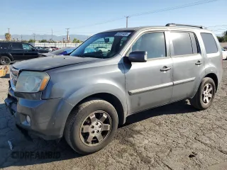 2011 Honda Pilot Touring z VIN 5FNYF3H96BB056700, wystawiony jako Copart lot #52231455 z przebiegiem 130 243 mil mil oraz Szkoda całkowita • Salvage title. Historia ofert i sprzedaży dostępna na DreamBid. Obrazek 1.