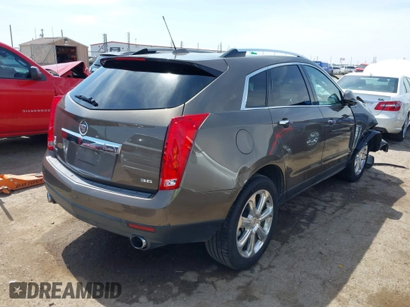 2016 Cadillac SRX Performance Collection z VIN 3GYFNCE39GS512286, wystawiony jako IAAI lot #42392467 z przebiegiem 95 708 mil mil oraz . Historia ofert i sprzedaży dostępna na DreamBid. Obrazek 4.
