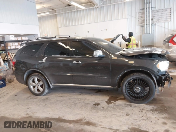 2011 Dodge Durango Citadel with VIN 1D4SE5GT6BC632724, listed as a IAAI auction lot 41590123 with 118,509 mi miles and . Bid and sale history available at DreamBid. Image 13.