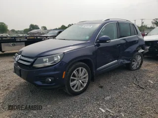 2015 Volkswagen Tiguan SEL z VIN WVGBV7AX7FW519238, wystawiony jako Copart lot #60274175 z przebiegiem 50 576 mil mil oraz Szkoda całkowita • Salvage title. Historia ofert i sprzedaży dostępna na DreamBid. Obrazek 1.